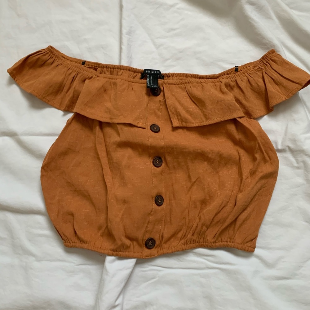 tangerine colored off the shoulder crop top